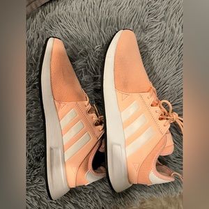 Worn pink adidas shoes
